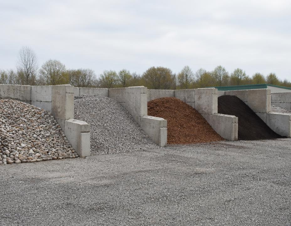 Bulk landscaping materials including river rock, gravel and cedar bark mulch